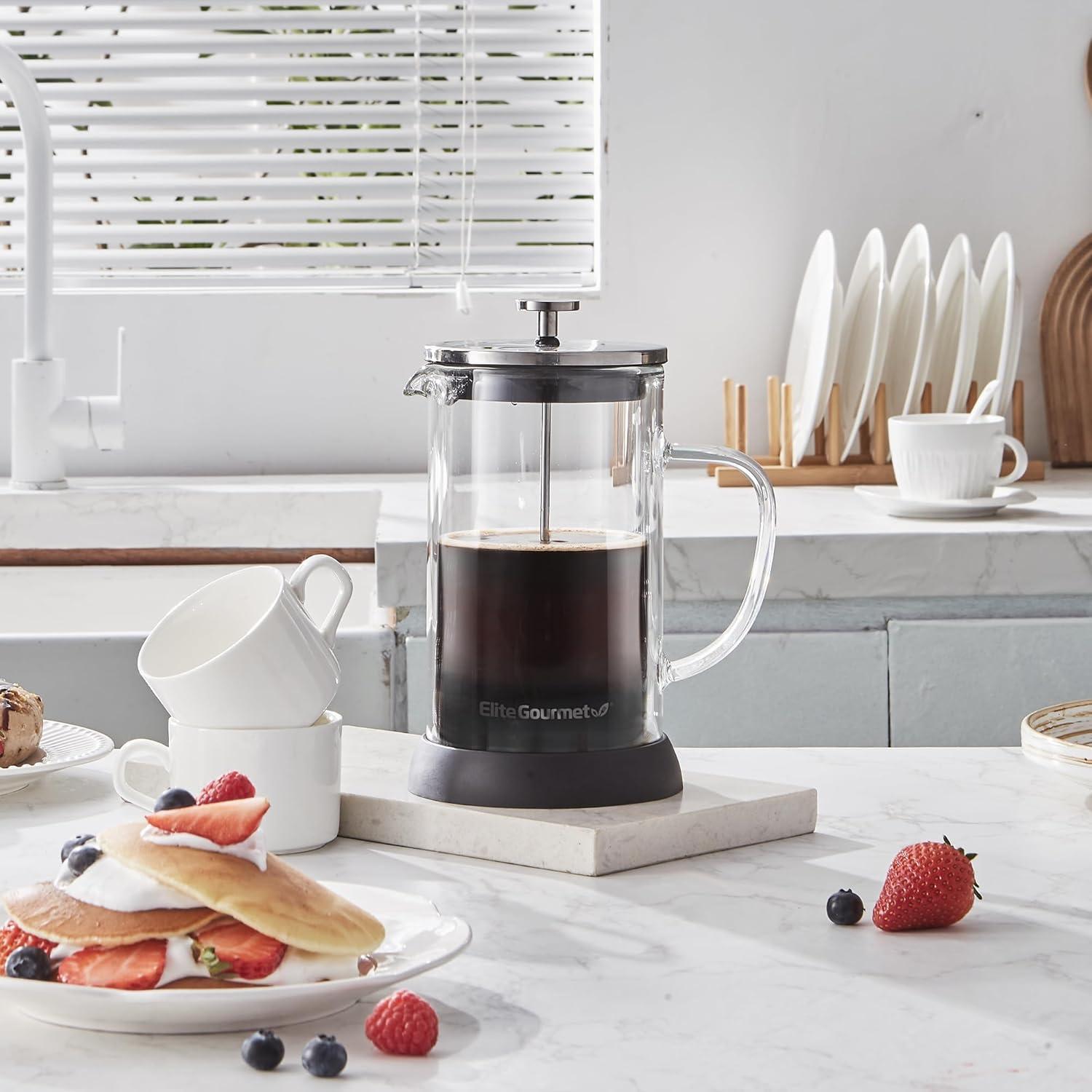 imageElite Gourmet EHC113 Personal SingleServe Compact Coffee Maker Brewer Includes 14Oz Stainless Steel Interior Thermal Travel Mug Compatible with Coffee Grounds Reusable Filter BlackGlass