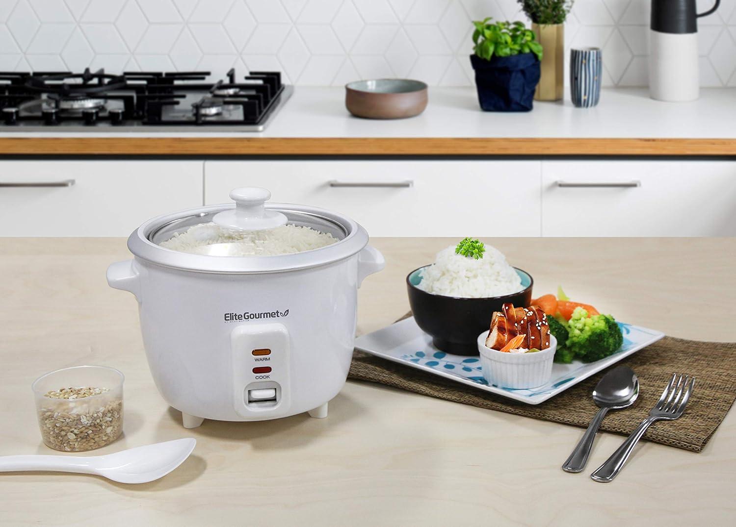 imageElite Gourmet ERC003BX Electric Rice Cooker with Automatic Keep Warm Makes Soups Stews Grains Hot Cereals 6 Cups Cooked 3 Cups Uncooked BlackWhite